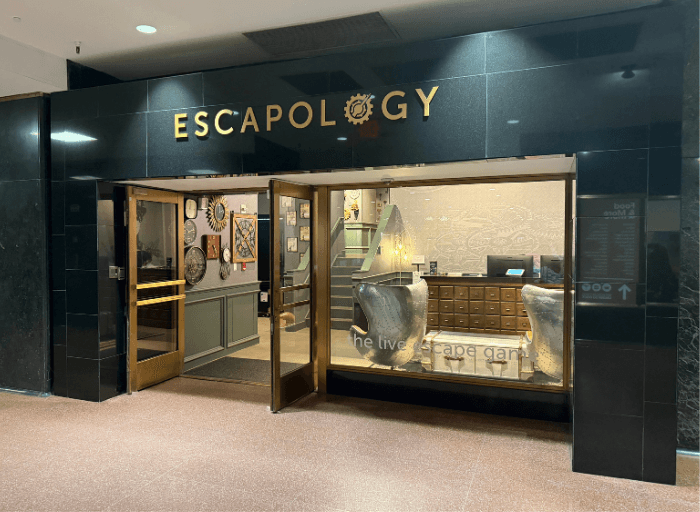 Front of Venue at Escapology Rockefeller Center with Logo above open doors