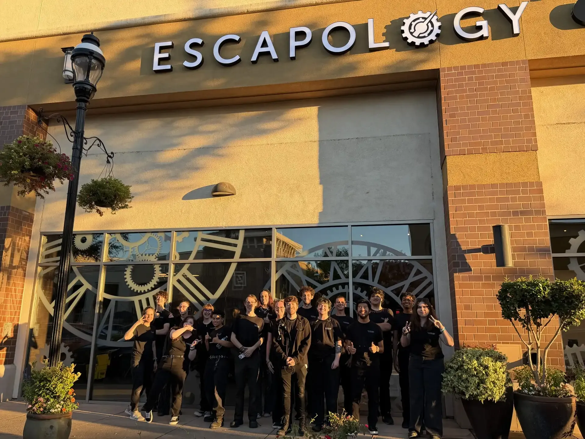 The Escapology Roseville staff outside the storefront