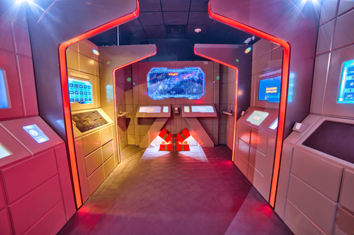 Space ship themed room with red lighting